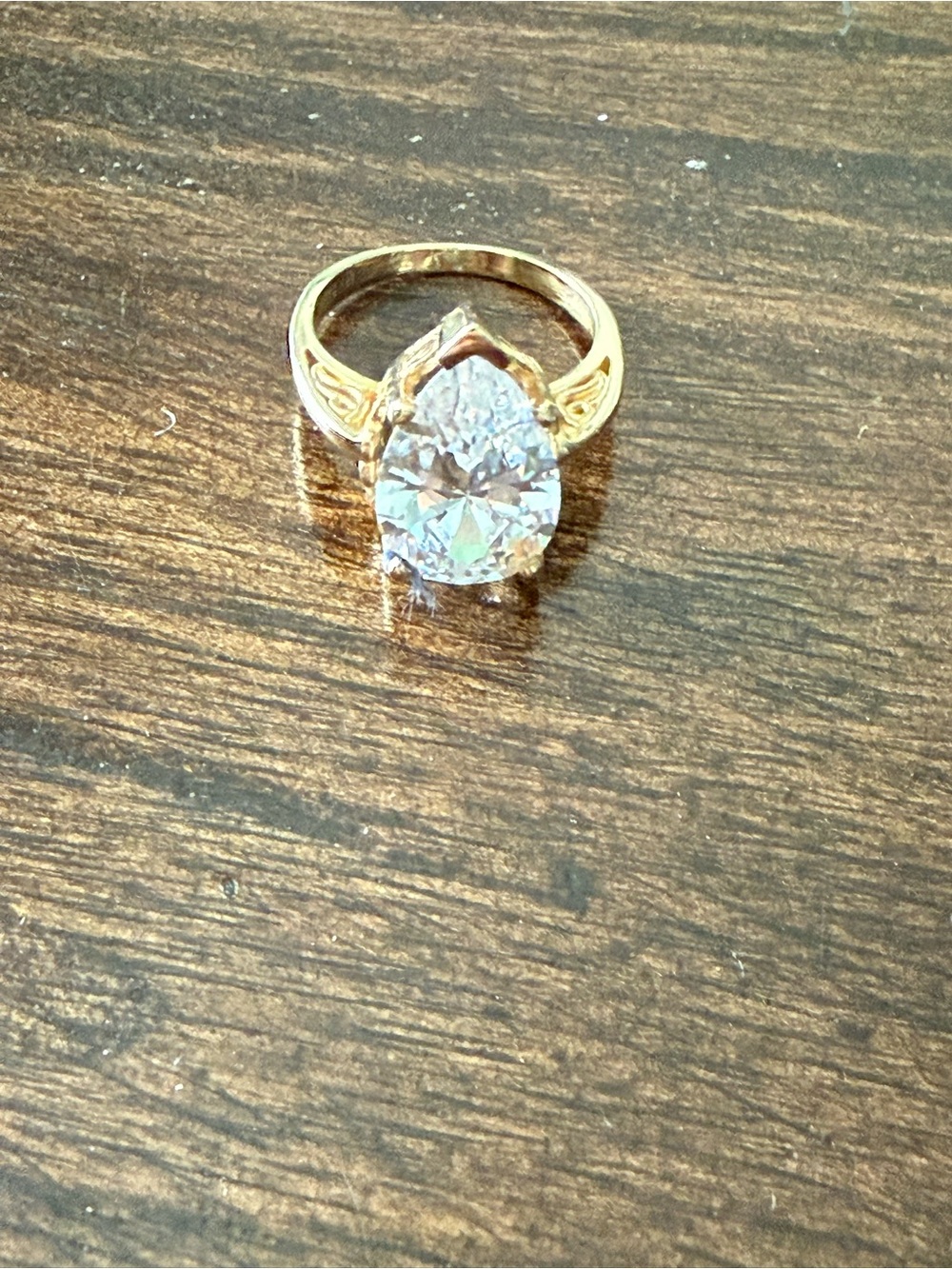 14K Gold Pear Cut Solitaire Ring with Clear Stone